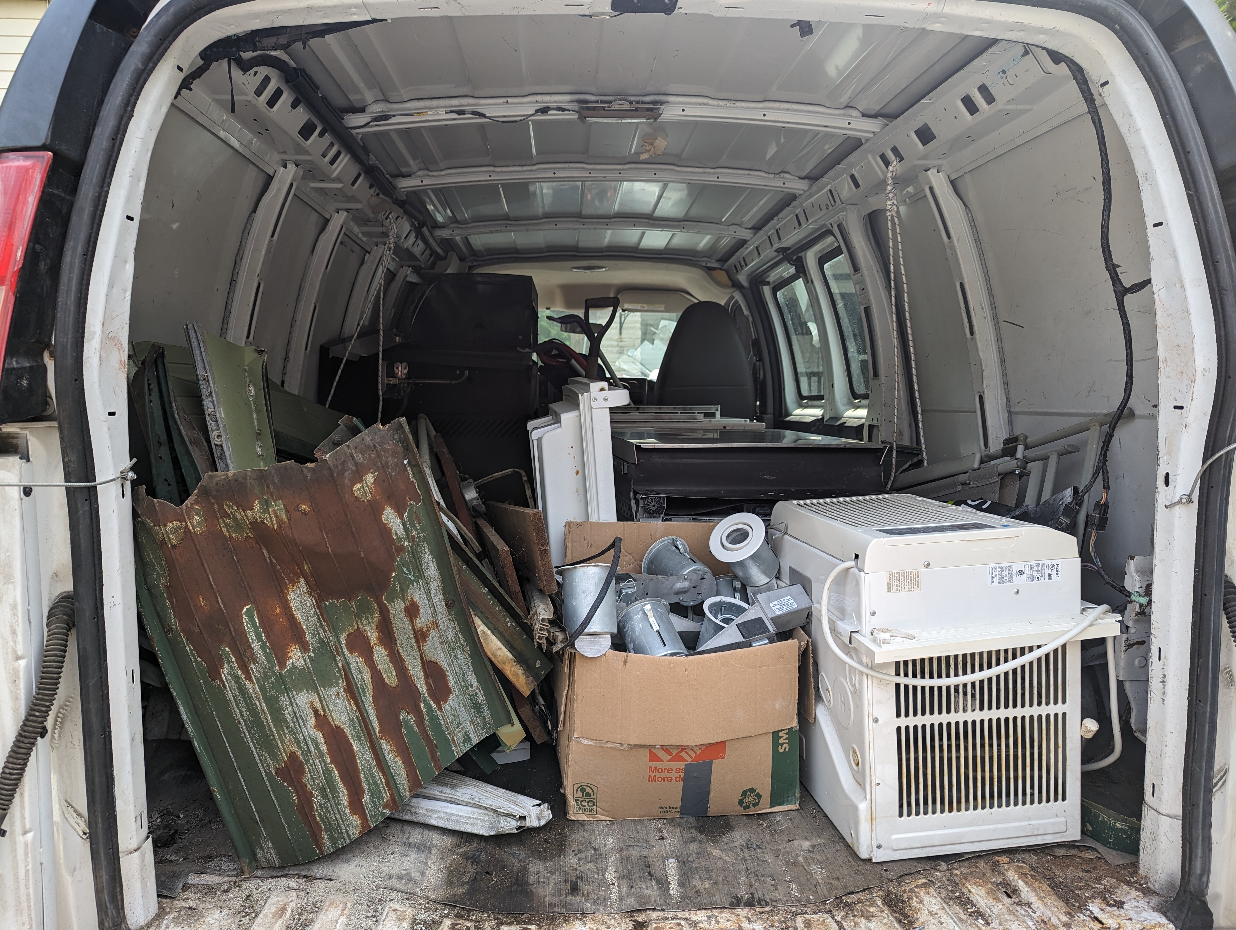 Various scrap metals in work van